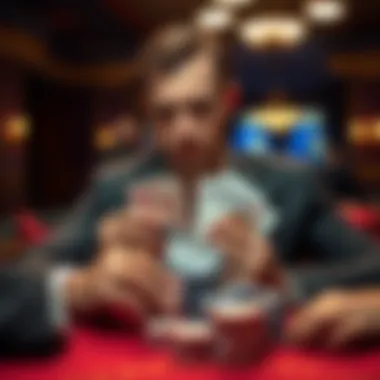 Player contemplating strategy while holding poker cards